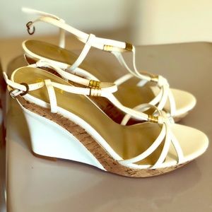 Woman’s white wedge heel